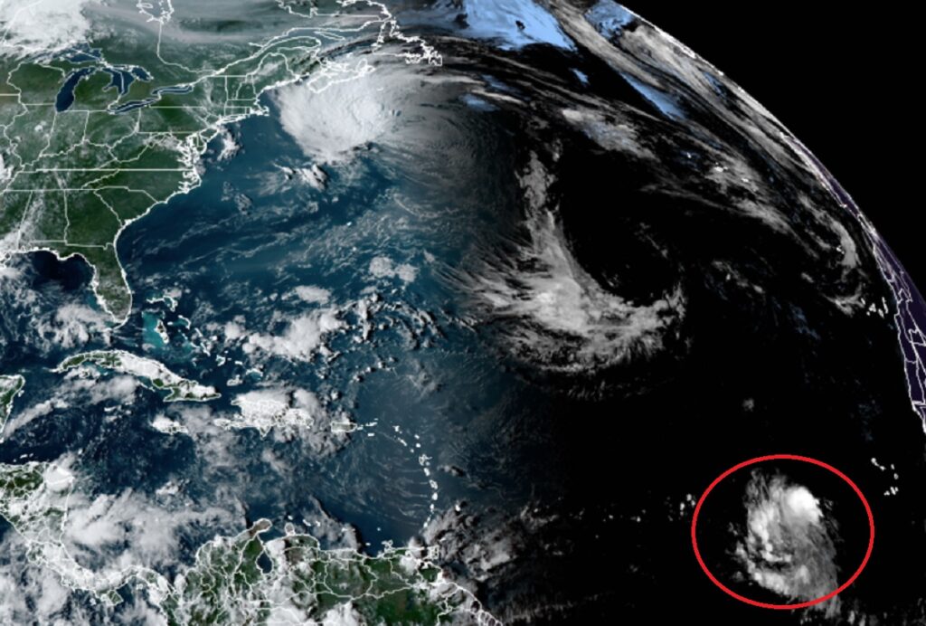 The latest view from the GOES-East weather satellite shows a system organizing in the Atlantic (circled in red); it is expected to become Hurricane Lee with time. Image: NOAA