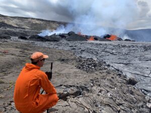 A USGS scientist observes the eruption of Kilauea on the Big Island of Hawaii last week. Image: USGS