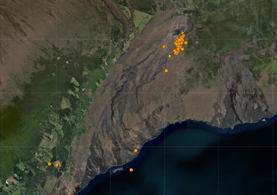 Each orange dot represents the epicenter of an earthquake to strike around Kilauea in the last 24 hours. Of note is the swarm of earthquakes happening south of the volcano's caldera, which appears as a dark crater on this view. Image: USGS