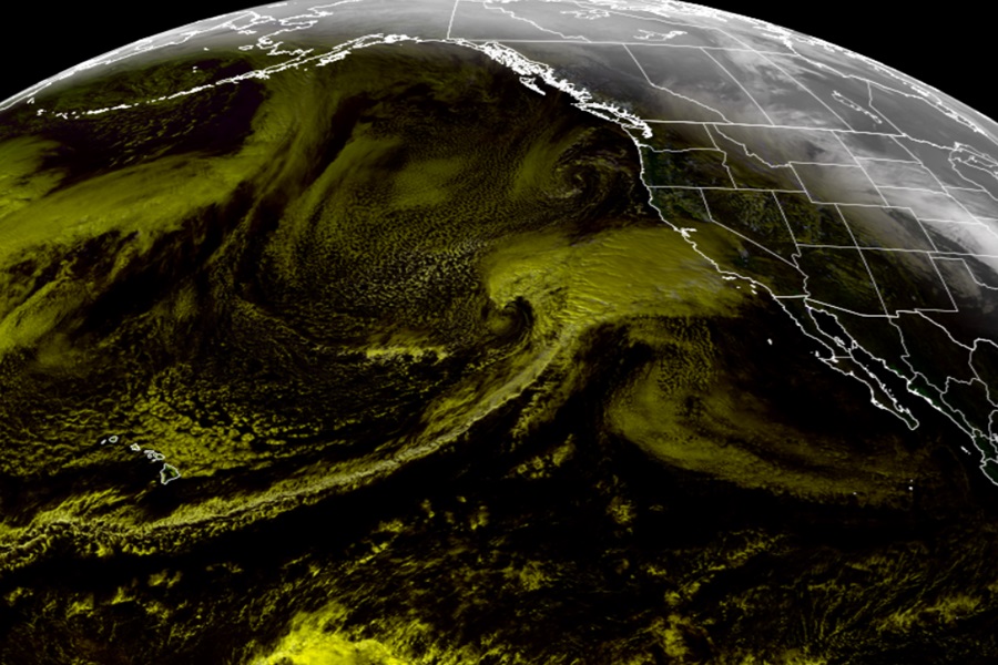 The latest GOES satellite image shows a storm gathering strength and moisture about to slam into California. Moisture is coming from the deep tropics near Hawaii, earning it the nickname "Pineapple Express." Image: NOAA