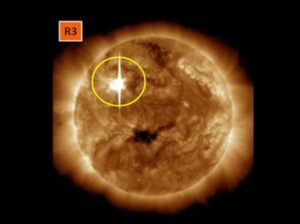 A massive solar flare leaves the sun from the circled area today. Image: SWPC