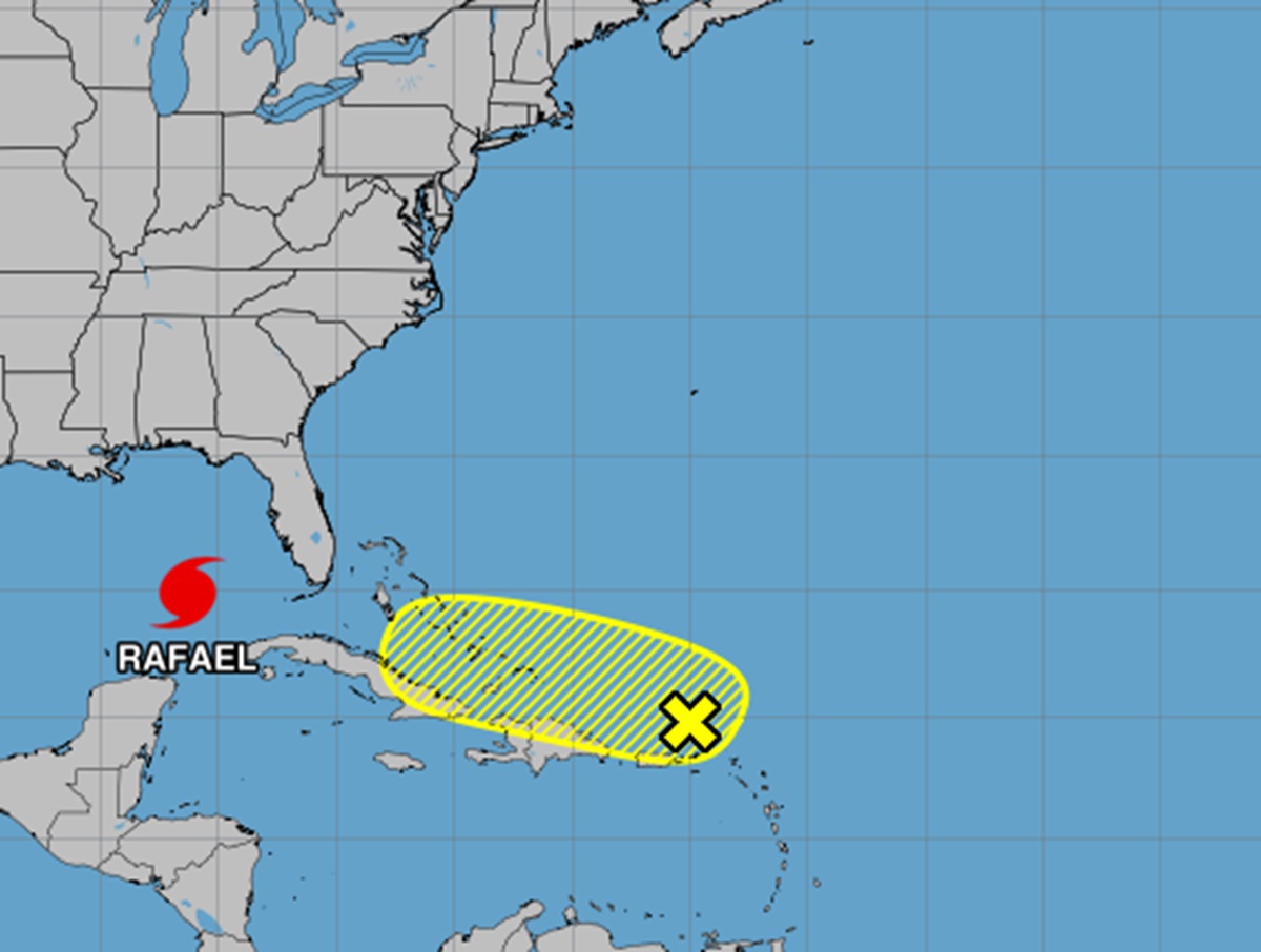 While Rafael gains strength in the Gulf, a second storm could take shape in the yellow shaded area over the next 7 days. Image: NHC