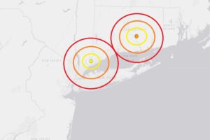 The epicenters are indicated by dots inside colored concentric circles. The earlier earthquake has a yellow dot while the most recent quake has an orange one. Image: USGS