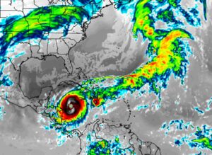 This simulated color enhanced satellite view derived from American GFS forecast guidance shows a well structured hurricane moving through the Caribbean into the Gulf of Mexico later this coming weekend. Image:tropicaltidbits.com