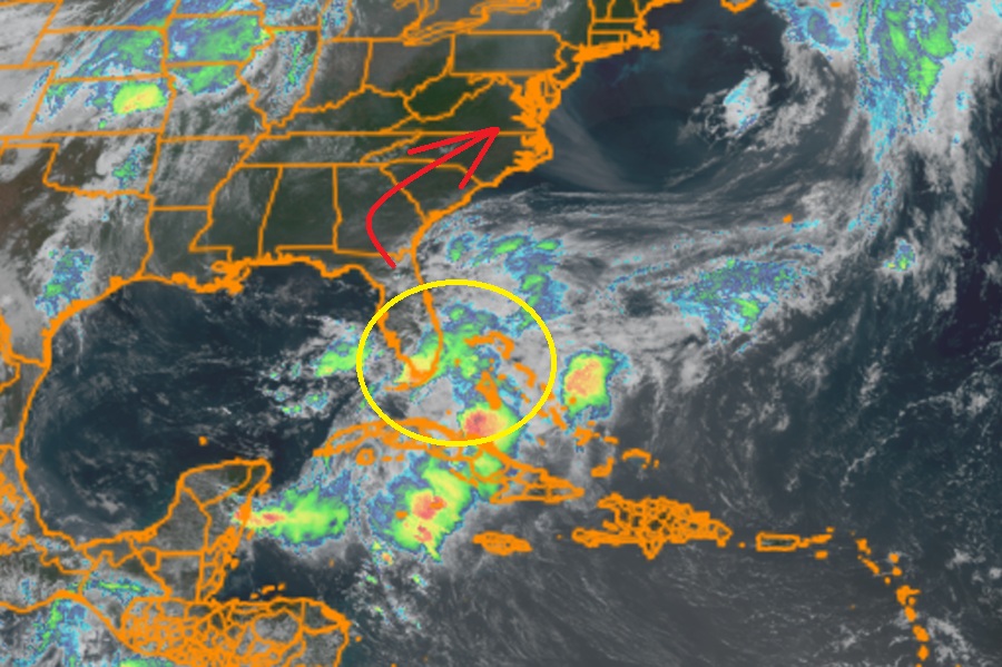 Current GOES-East satellite with the disturbance being tracked by the National Hurricane Center circled in yellow. It is expected to travel in the direction of the red arrow this week. Image: NHC
