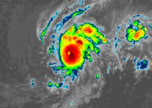 Current view of Hurricane Iona from NOAA's GOES-West weather satellite. The cluster of storms and showers on the east side of the hurricane is Tropical Storm Keli. Image: NOAA