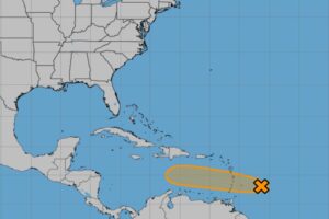 A disturbance marked by the X could develop into a tropical cyclone as it moves into the orange shaded region of the map. Image: NHC