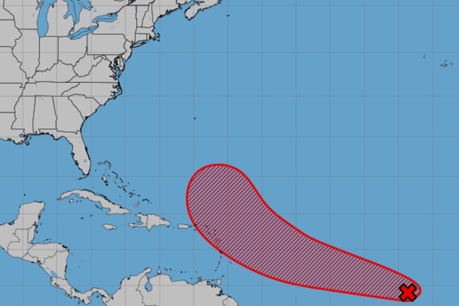 The developing tropical cyclone is near the red X and would develop more and move into the area shaded by red with time. Image: NHC