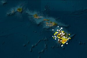 Each dot represents the epicenter of an earthquake that was magnitude 1.5 or greater in Hawaii over the last 30 days, with white dots reflecting the oldest quakes and orange dots reflecting the newest. Image: USGS