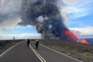 A Volcano Watch is in effect for Kilauea Volcano. In the late morning of December 6, 2025, a crew of USGS Hawaiian Volcano Observatory scientists walked to the southern rim of Halemaʻumaʻu to watch Kīlauea summit eruption episode 38. Along the way they had dramatic views of the eruptive plume, which reached an altitude of over 20,000 feet above sea level during this episode. Image: USGS / M. Zoeller