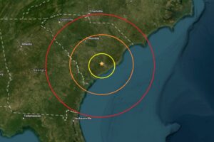 Today's earthquake struck at the orange dot inside the concentric colored circles. Image: USGS