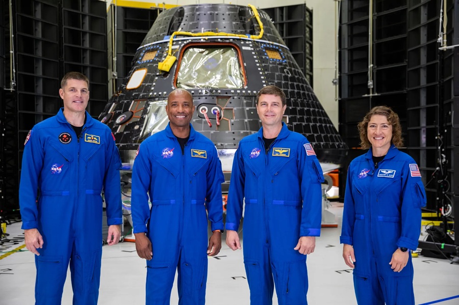 The Artemis II crew is shown inside the Neil Armstrong Operations and Checkout Building at NASA’s Kennedy Space Center in Florida in front of their Orion crew module on Aug. 8, 2023. From left are: Jeremy Hansen, mission specialist; Victor Glover, pilot; Reid Wiseman, commander; and Christina Hammock Koch, mission specialist. Image: NASA / Kim Shiflett