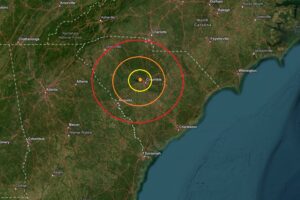 Today's earthquake struck at the orange dot inside the colored, concentric circles on this map. Image: USGS