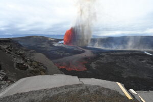 This is the view of the April 9, 2026 eruption of Kilauea with a portion of Crater Rim Drive that was damaged during the 2018 collapse in the foreground. Image: USGS / L. Gallant.