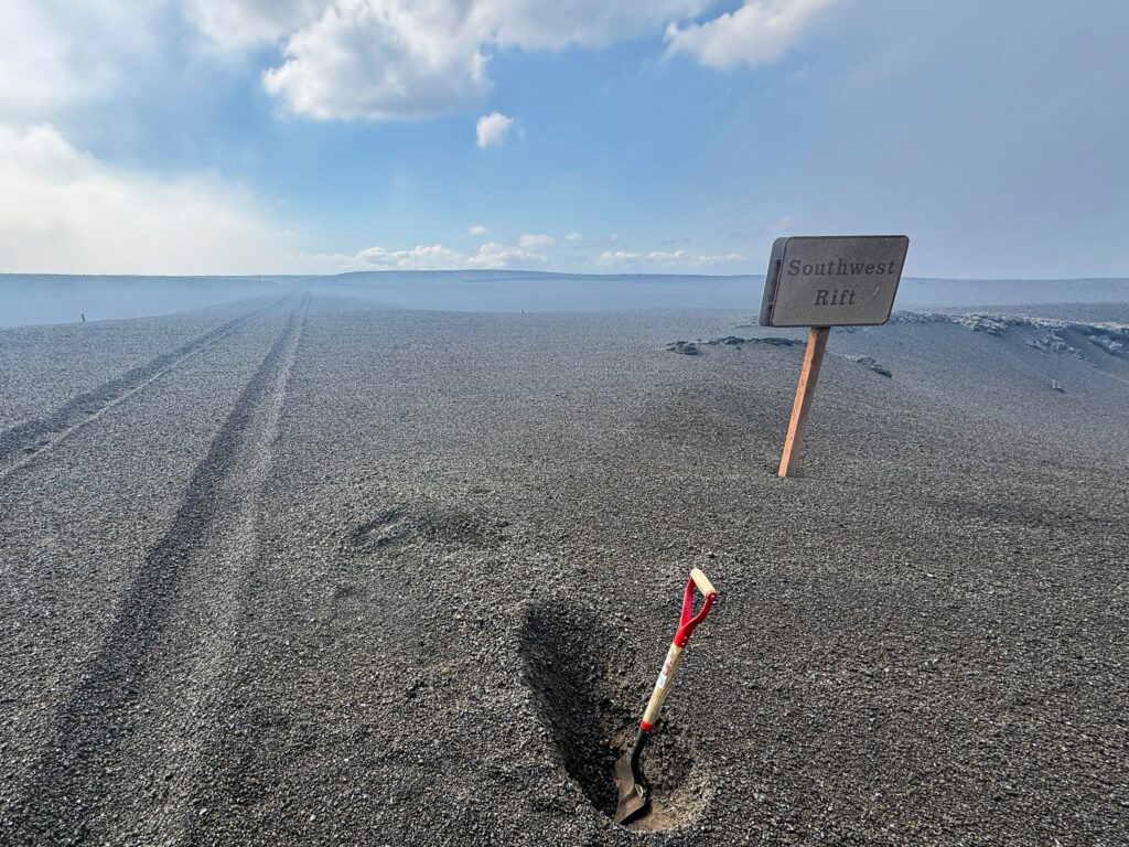 Tephra covers the entire landscape, including this road, after a recent eruption of the Kilauea Volcano in Hawaii. Image: USGS / M. Patrick