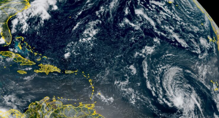 Tropical Storm Dolly appears as a swirl of clouds over the central Atlantic Ocean today. Image: NOAA