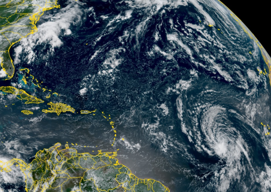 Tropical Storm Dolly appears as a swirl of clouds over the central Atlantic Ocean today. Image: NOAA