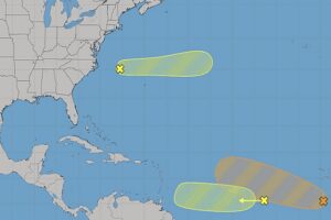 The National Hurricane Center is tracking three areas that could develop into a tropical cyclone over time; the orange shaded area is the most likely of the three to develop into something. Image: NHC