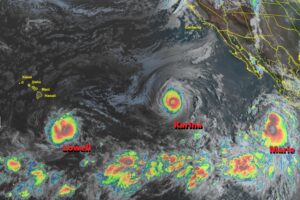 The latest GOES-West weather satellite view showing three named storms marching across the Pacific Ocean. Image: NOAA