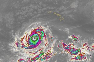 Color enhanced infrared image from the GOES-West weather satellite shows Lowell swirling south of the state of Hawaii now. Image; NOAA