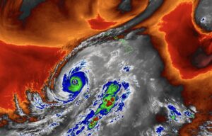 This view from the GOES-West weather satellite shows both Hurricane Lowell getting closer to Hawaii while a tremndous amount of moisture and clouds east of it is moving north into the state. Image: NOAA