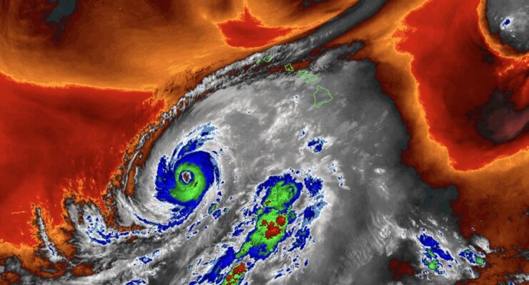 This view from the GOES-West weather satellite shows both Hurricane Lowell getting closer to Hawaii while a tremndous amount of moisture and clouds east of it is moving north into the state. Image: NOAA