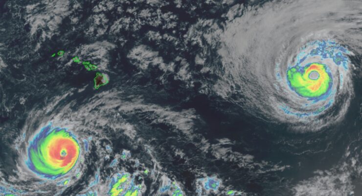 The latest GOES-West weather satellite view shows Hurricanes Lowell, left, and Karina, right, approaching Hawaii. Image: NOAA