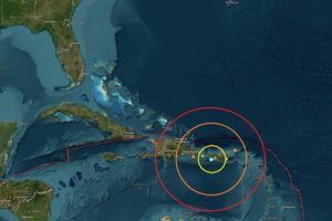The earthquake which triggered the tsunami bulletin today is located at the blue dot inside the colored concentric circles on this map. The other orange dots reflect other earthquakes from the last 24 hours. Image: USGS