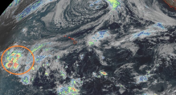 The area circled in orange south and west of Hawaii is forecast to move closer to Hawaii in the coming days, bringing heavy rains and strong, potentially damaging wind gusts, to the State of Hawaii. Image: NOAA