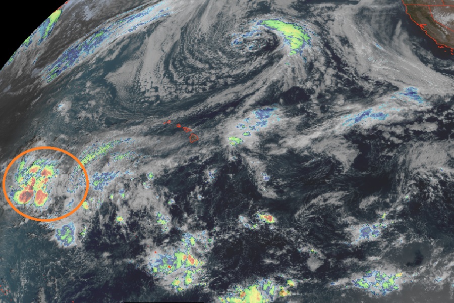 The area circled in orange south and west of Hawaii is forecast to move closer to Hawaii in the coming days, bringing heavy rains and strong, potentially damaging wind gusts, to the State of Hawaii. Image: NOAA