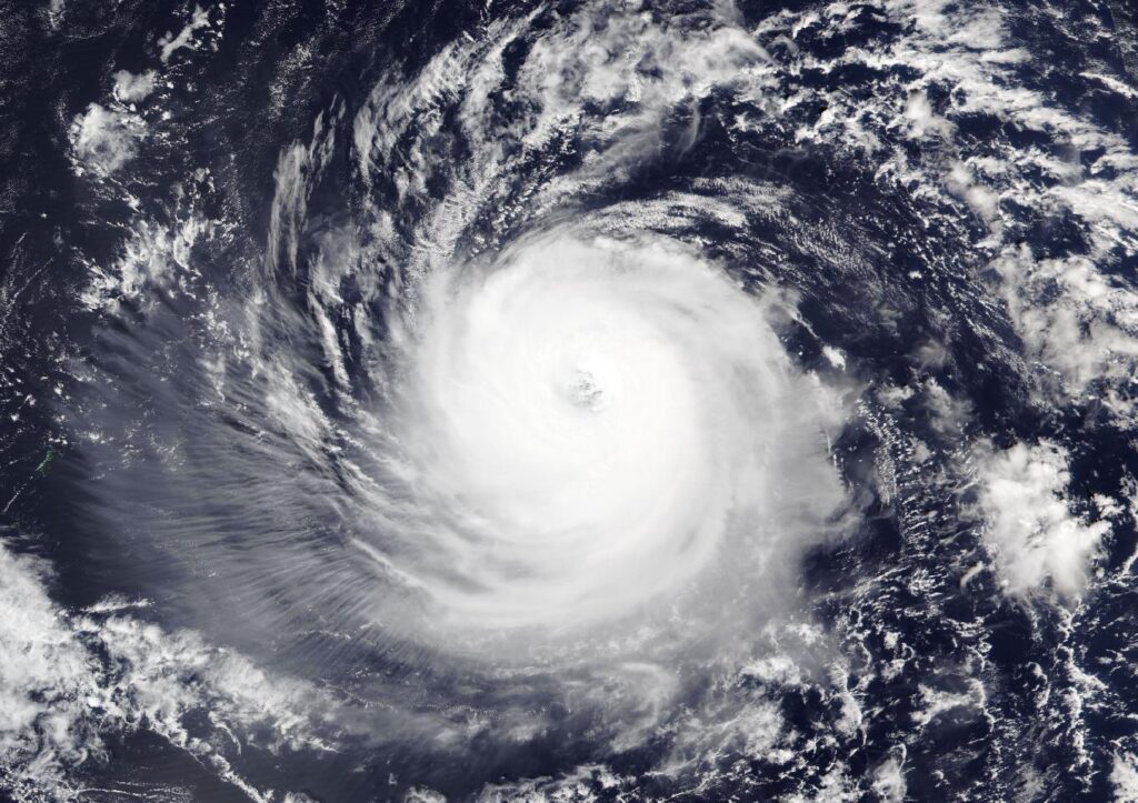 Typhoon In-fa over the western Pacific east of the Mariana Islands, seen in true color by the VIIRS instrument on the NOAA-20 satellite, Oct. 29, 2026. Part of the Mariana Islands chain is visible at the far left edge. Image: NASA Worldview / NOAA